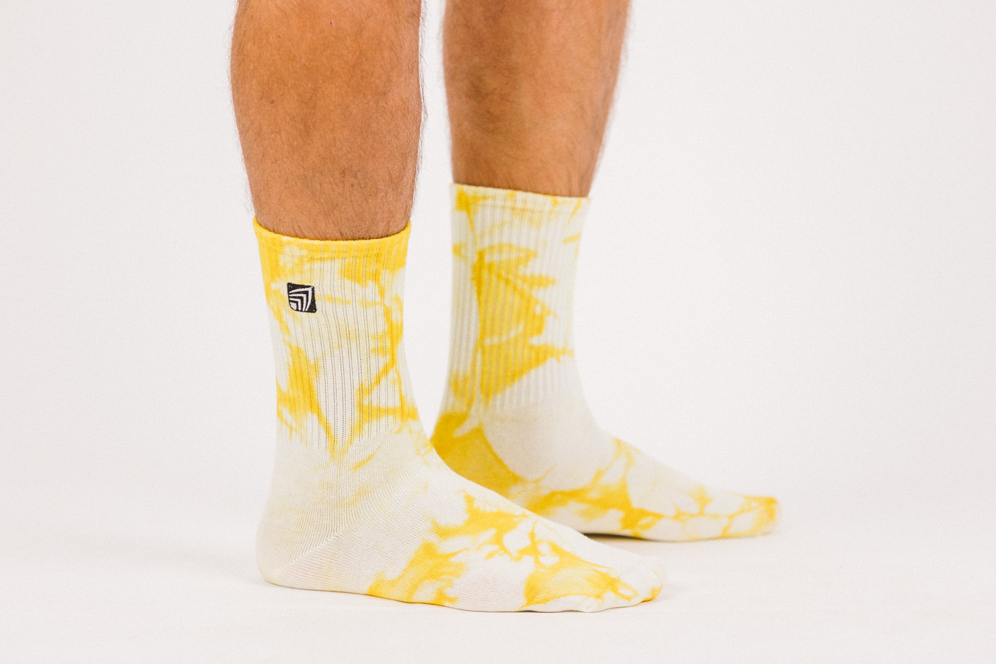 blue and yellow tie dye socks
